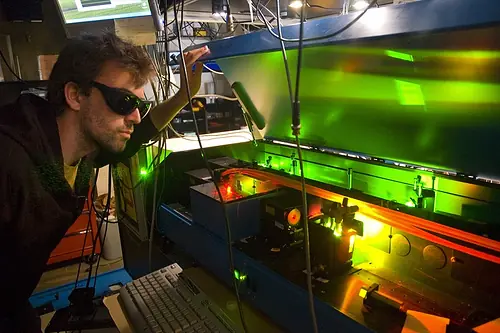 Dan Lobser overlooks a doubled pulse dye laser
