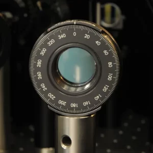 Photograph of a λ/2 waveplate (retarder) mounted in a 1-inch rotation mount. The waveplate shifts the phase of one specific linear polarization component of transmitted light with respect to the orthogonal one.