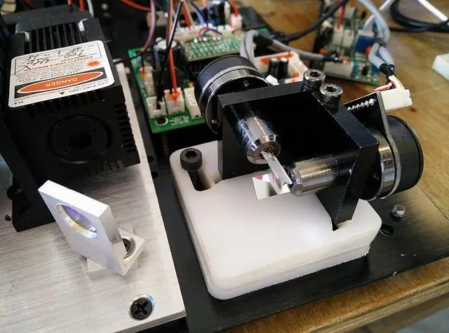 Mirror galvo in an RGB laser projector for beam steering.