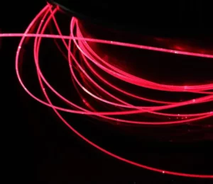 Injection of a Helium-Neon laser beam into a plastic optical fiber.